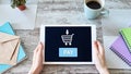Online payment an e-commerce concept. Pay button on tablet screen. Royalty Free Stock Photo