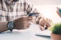 Online payment,Man`s hands holding a credit card and using laptop computer for online shopping Royalty Free Stock Photo