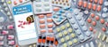 Online pharmacy. Application in smartphone for online ordering of medicines. Lots of pills. The concept of convenient choice of