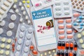 Online pharmacy. Application in your smartphone for online ordering of medicines. Lots of pills. The concept of