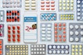 Online pharmacy. Application in your smartphone for online ordering of medicines. Lots of pills. Flat lay