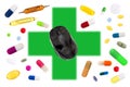 Online pharmacy concept with a Mouse on green cross with medecine, pills, capsules, tablets, medicinal pouch on white