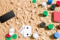 Online poker game on the beach with digital smart and stacks of chips. Top view Royalty Free Stock Photo