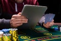 Online poker players sitting at the table Royalty Free Stock Photo