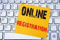 Online Registration. Business concept for Internet Login written on sticky note paper on the white keyboard background.