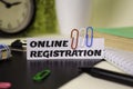 Online Registration on the paper isolated on it desk. Business and inspiration concept Royalty Free Stock Photo