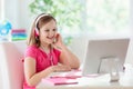 Online remote learning. School kids with computer Royalty Free Stock Photo