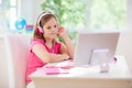 Online remote learning. School kids with computer Royalty Free Stock Photo