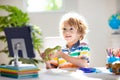 Online remote learning. School kids with computer Royalty Free Stock Photo