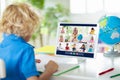 Online remote learning. School kids with computer Royalty Free Stock Photo