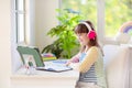 Online remote learning. School kids with computer Royalty Free Stock Photo