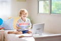 Online remote learning. School kids with computer Royalty Free Stock Photo