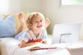 Online remote learning. School kids with computer Royalty Free Stock Photo