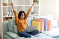 Online Sales. Joyful Arab Woman Celebrating Success With Laptop