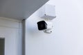 Online Security CCTV camera surveillance system outdoor of house. A blurred night city scape background. Real time Modern CCTV cam Royalty Free Stock Photo