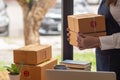 Online seller packs and opts for logistics service that can pick up from her office to save time and deliver fast delivery. Online