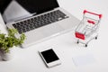 Online shopping. Shopping cart, keyboard, bank card Royalty Free Stock Photo