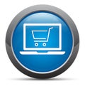 Online shopping cart laptop icon premium blue round button vector illustration Royalty Free Stock Photo