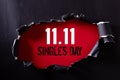 Online shopping of China, 11.11 single`s day sale concept. Top view of Black torn paper and the text 11.11 single`s day sale on Royalty Free Stock Photo