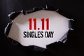 Online shopping of China, 11.11 singles day sale concept. Top view of Black torn paper and the text 11.11 singles day sale on a Royalty Free Stock Photo