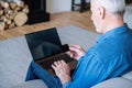 Man using credit card and notebook, making purchase online Royalty Free Stock Photo