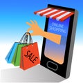 Online shopping concept. Shopping cart with bags standing upon big mobile phone. Flat vector design isolated on blue background. Royalty Free Stock Photo