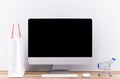 Online shopping concept with desktop computer screen . Royalty Free Stock Photo