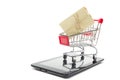 Online shopping concept - Empty Shopping Cart, laptop and tablet pc, smartphone isolated on white background. Copy space Royalty Free Stock Photo