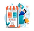 Online shopping concept in modern flat design. Woman buying and paying for goods in mobile application using credit card. Customer Royalty Free Stock Photo