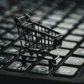 Online shopping concept, small shopping cart stands on keyboard, dark background, digital e-commerce. Generative AI Royalty Free Stock Photo