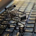 Online shopping concept, small shopping cart stands on keyboard, dark background, digital e-commerce. Generative AI Royalty Free Stock Photo