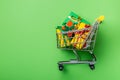 Online shopping concept - trolley cart full of presents