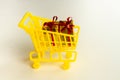 Online shopping concept - trolley cart full of presents.