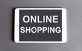 Online shopping concept - word on a digital tablet Royalty Free Stock Photo