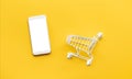 Online shopping concepts with mockup trolley and smartphone.Ecommerce market.Transportation logistic.Business retail.Seller and Royalty Free Stock Photo