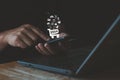 Online shopping and e-commerce concept. Hand of young businessman using smartphone with shopping cart icon. Royalty Free Stock Photo