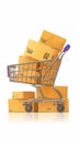 Online shopping growth paper boxes in trolley on wooden block Royalty Free Stock Photo