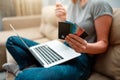 Online shopping at home. Hands are holding credit cards and using laptop before buying in an online shop Royalty Free Stock Photo