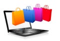 Online Shopping on the Internet, Laptop and shopping bags Royalty Free Stock Photo