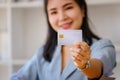 Online Shopping and Internet Payments, Asian wonam are using their credit card to shop online or onduct errands in the