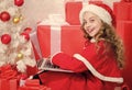 Online shopping. Letter for santa. Wish list. Child santa enjoy christmas eve. Girl little kid typing letter to santa on Royalty Free Stock Photo