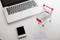 Online shopping. Shopping cart, keyboard, bank card Royalty Free Stock Photo