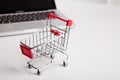 Online shopping. Shopping cart, keyboard, bank card Royalty Free Stock Photo