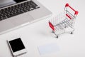 Online shopping. Shopping cart, keyboard, bank card Royalty Free Stock Photo