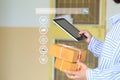 Online shopping, Woman hand holding smart phone and tracking parcel online to update status with hologram, Ecommerce and delivery