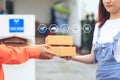 Online shopping, Woman receiving parcel from delivery man bringing some package at the home, shipping and postal service concept