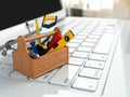 Online support. Toolbox with tools on laptop. Royalty Free Stock Photo