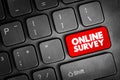 Online survey button highlighted on computer keyboard, concept of digital feedback, user response, internet research, data Royalty Free Stock Photo