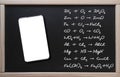 . Online training, chemistry. Tablet on the background of a class board with written chemistry formulas