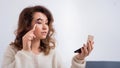 Online training for make-up. A woman teacher explains the makeup application scheme on the air Royalty Free Stock Photo